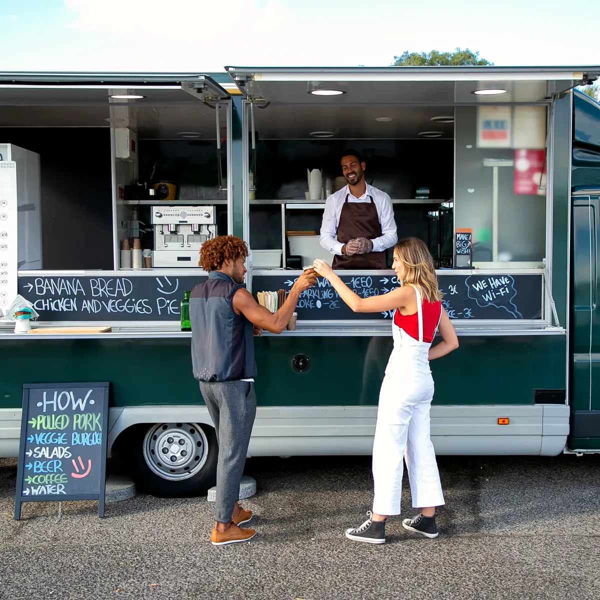 Food truck serving customers at an outdoor location